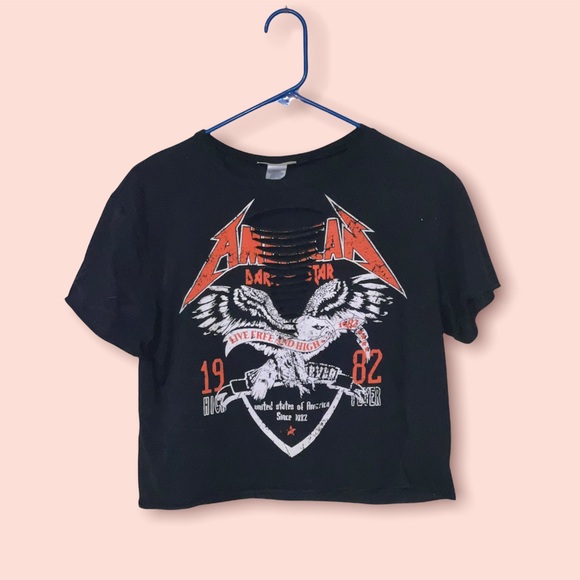 A crop top. Ripped from the center. Design  is Rock - Picture 4 of 6